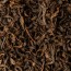 Листья крупнолистного юньнаньского чайного дерева. 100% китайский чай пуэр с ароматизатором сгущенное молоко.